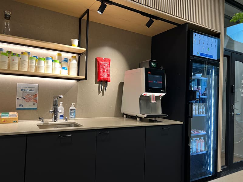 A Moi Store smart cabinet in a workplace break area